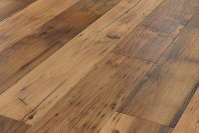 Close-up of luxury vinyl plank waterproof flooring in a basement setting